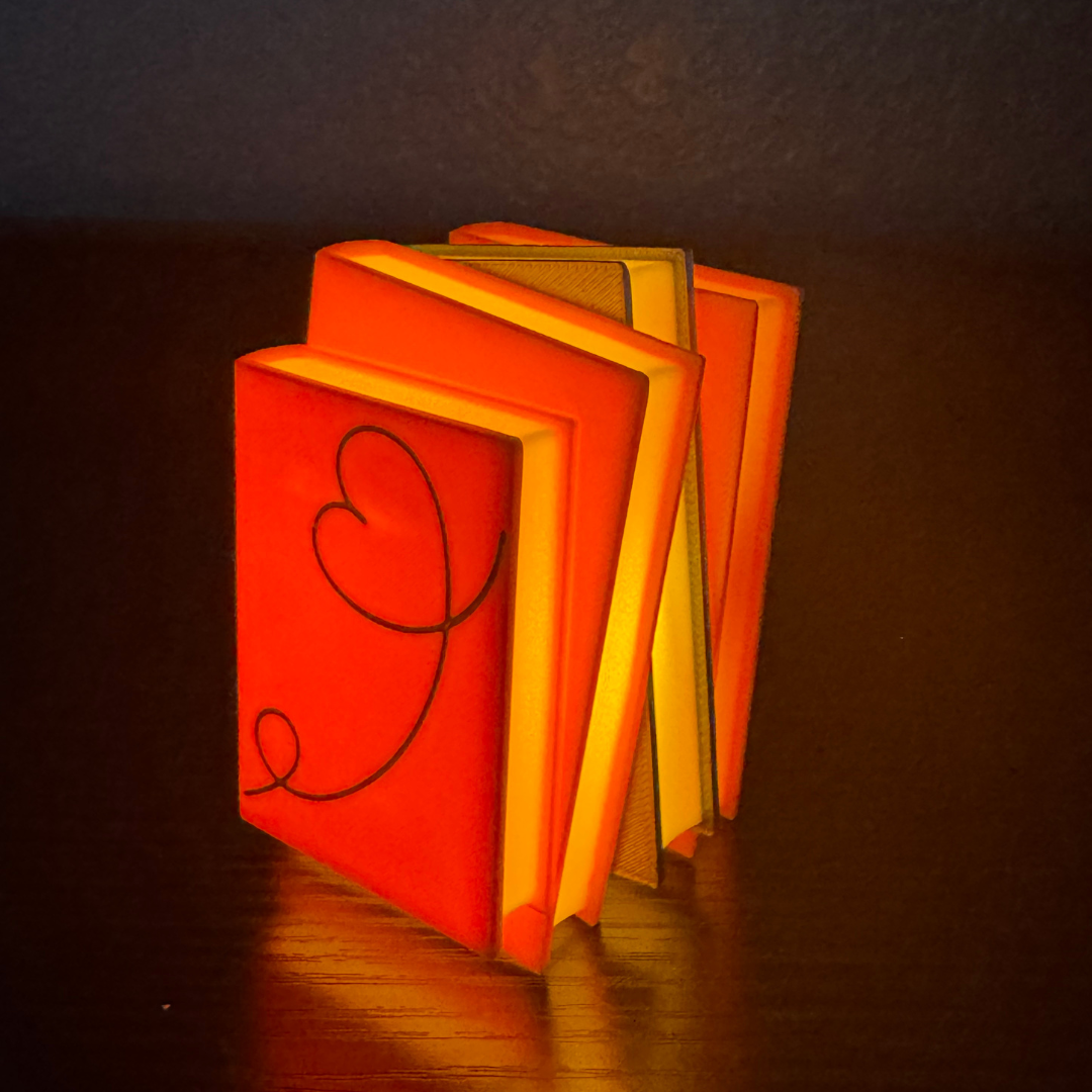 Side view of the romance novel light up book stacks standing up showing the book pages on the bookshelf.