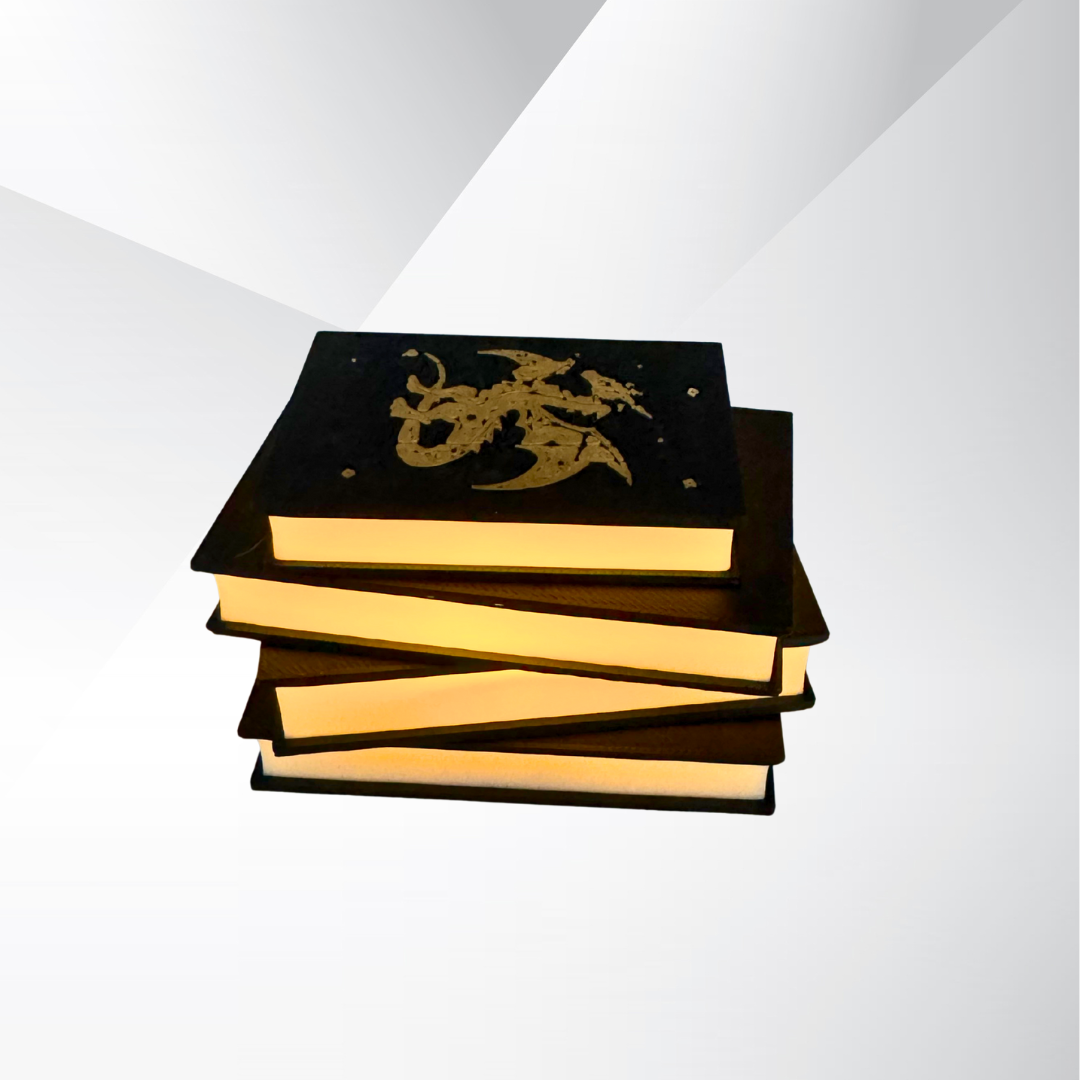 The front view of the fantasy dragon book light turned on with a white and silver background.