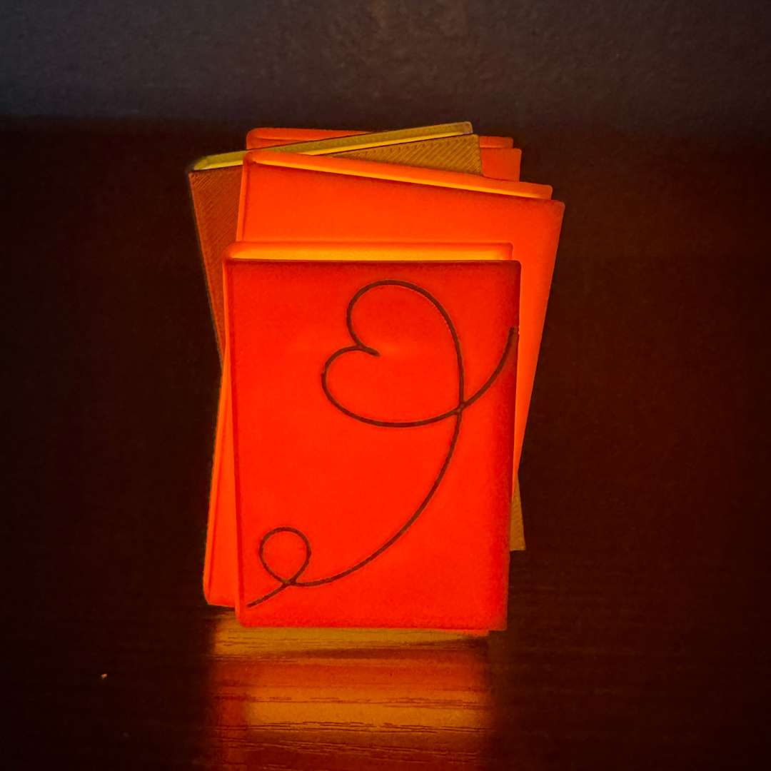 View of the romance novel light up book stack standing up showing off the front view.
