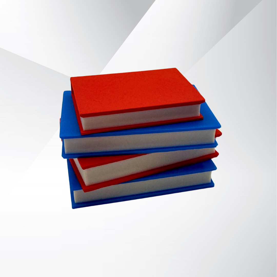 Vibrant red and blue light up stack of books with a white and silver background.