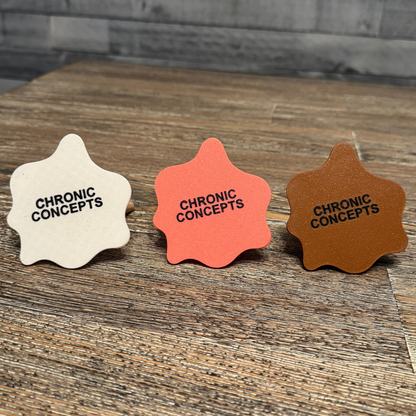 Bottom of melting ice cream cone sculpture with Chronic Concepts on bottom.