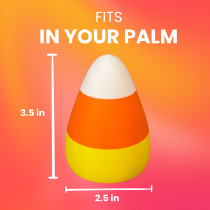 A candy corn light on a festive fall background showing the dimensions of the product.
