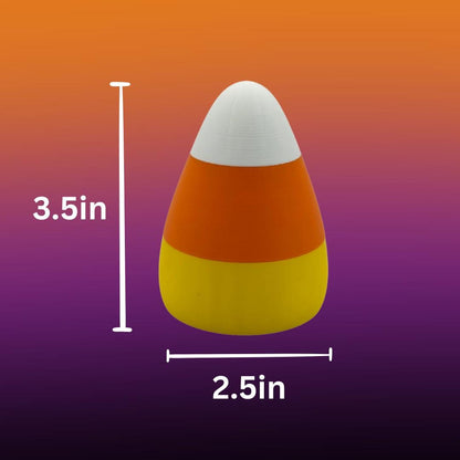 A candy corn light on a festive fall background showing the dimensions of the product.
