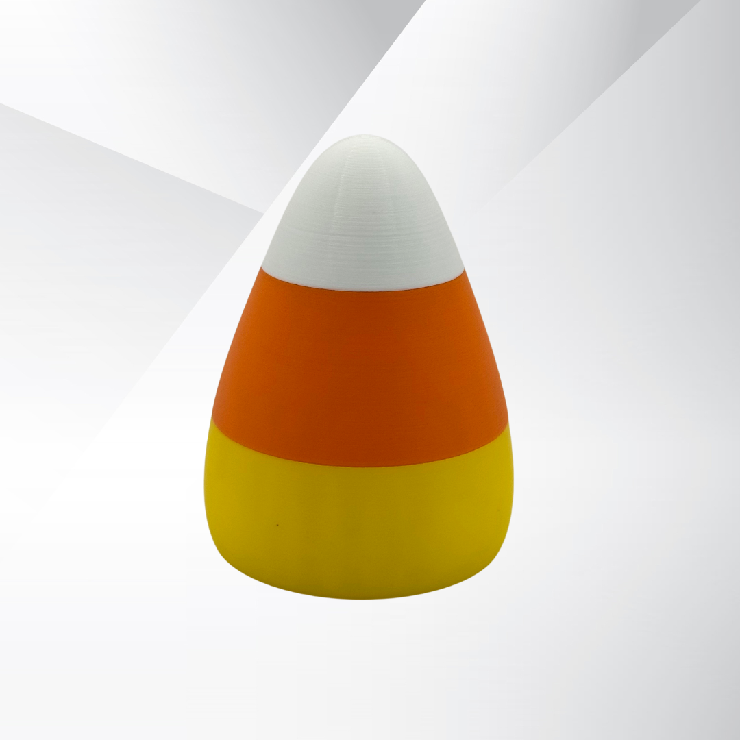 The front view of the candy corn light with a silver and white background.