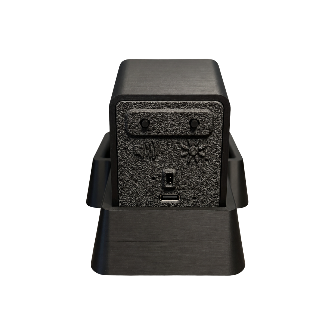 Back of the Black coin tray with an Insert Coin Cube inside.