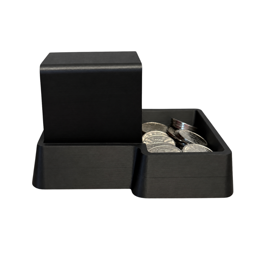 Right side of the Black coin tray with an Insert Coin Cube inside.