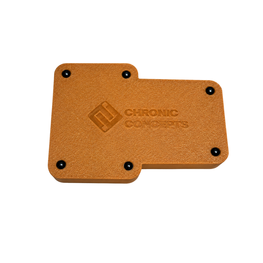 Bottom of the brown brick coin tray.