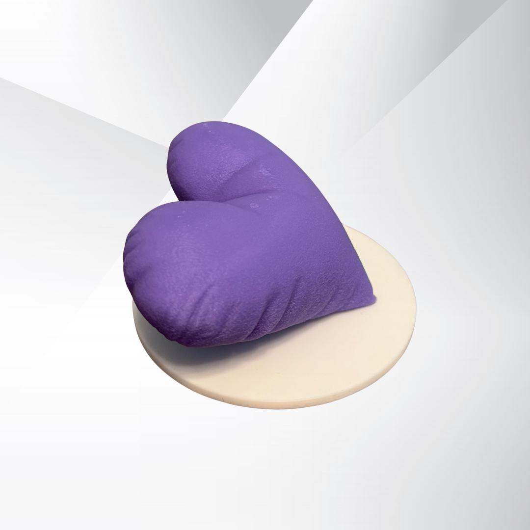 The side view of the purple 3d printed heart sculpture.