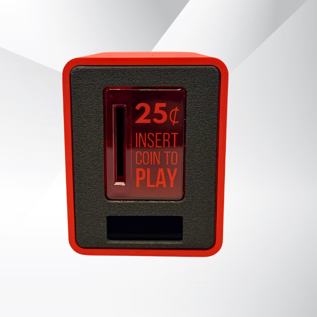 Studio close-up of the red TinyBrights™ Insert Coin Cube showing the arcade-style coin slot and front panel.