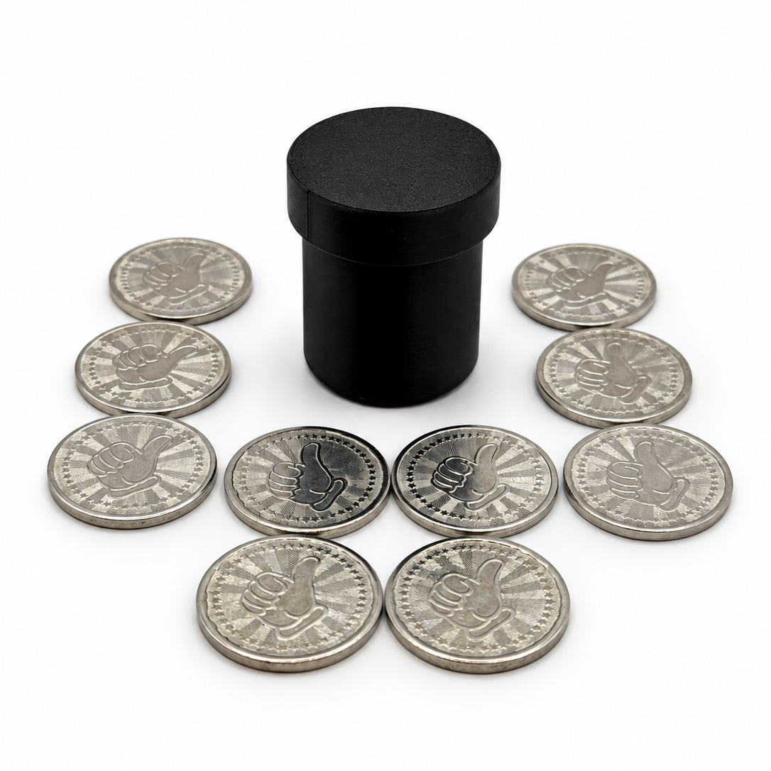Arcade Token Vault for Insert Coin Cube with ten tokens on a white background.