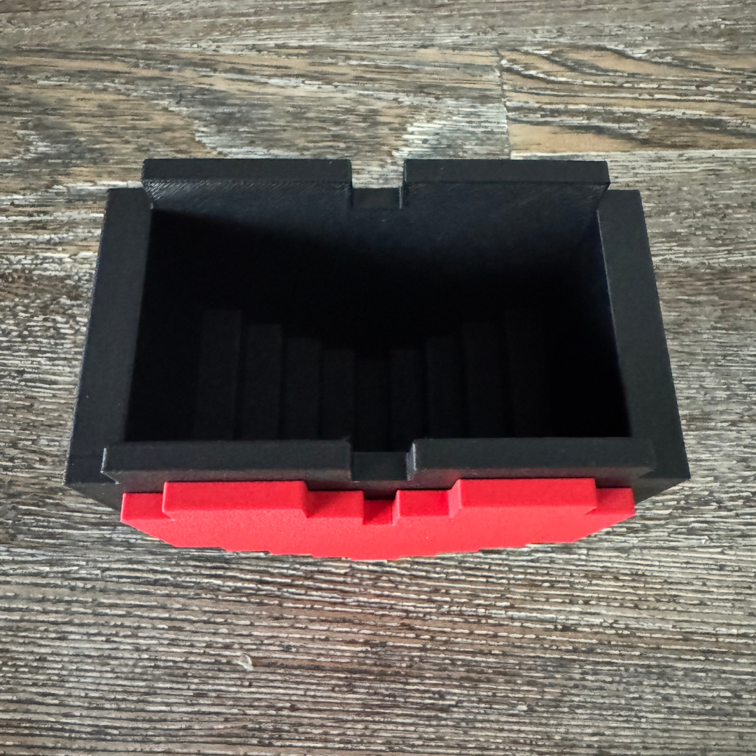 Top view of the 8-Bit Pixel Heart Gaming Pen & Pencil Holder while sitting on a wooden table.