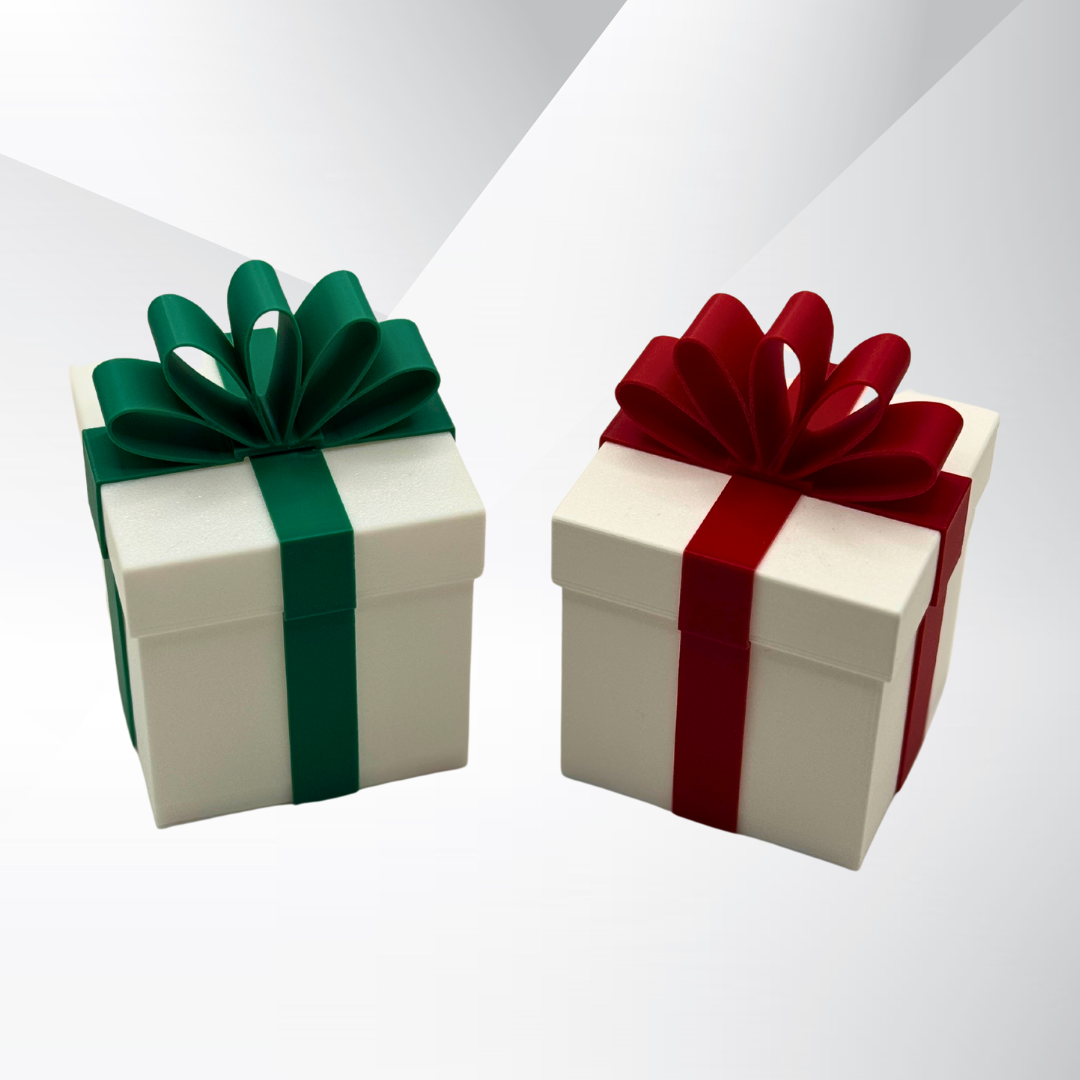 Two white Christmas packages that light up. One with a green ribbon and one with a red ribbon with a silver gradient background.