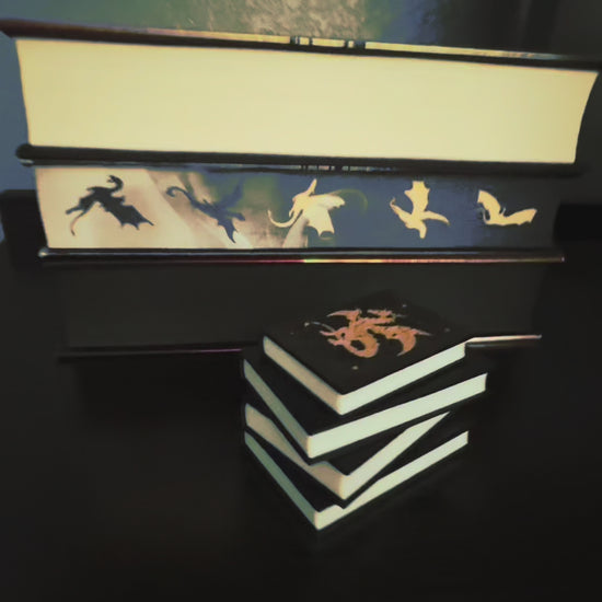360 view of the Fantasy Dragon Book Stack Light with the lights on and off.