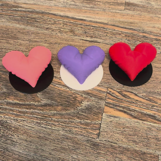 Video showing the three heart sculptures close up and their size.